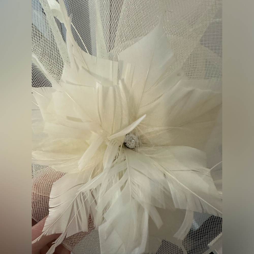 Cream colored fascinator